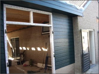 Renovatie kunststof dubbele openslaande tuin deuren aansluiting gevelpanelen in Zeeland